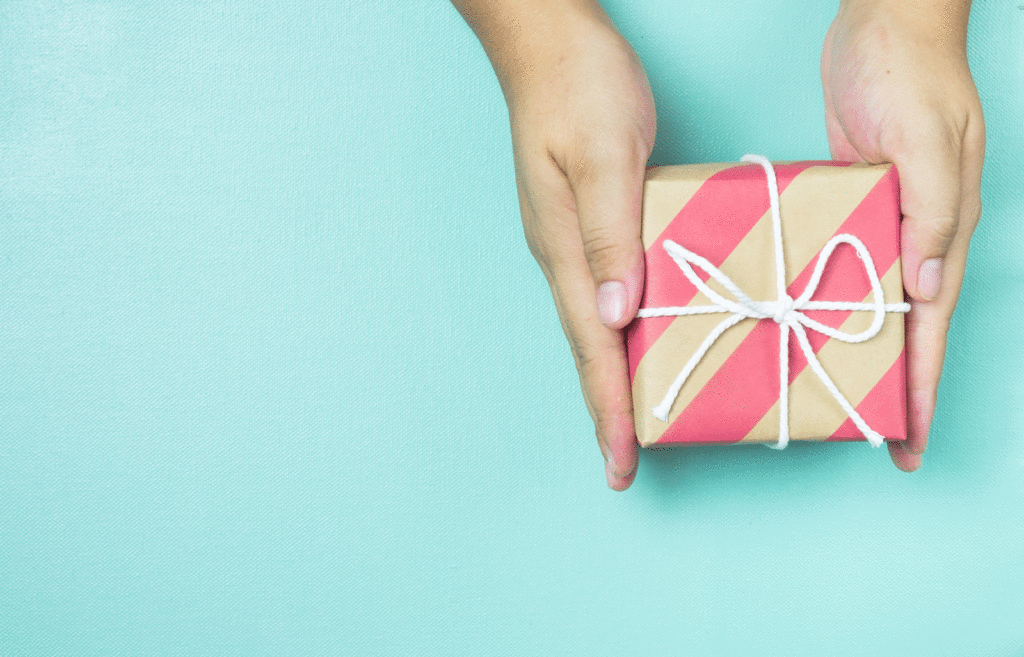 Woman holding a wrapped gift