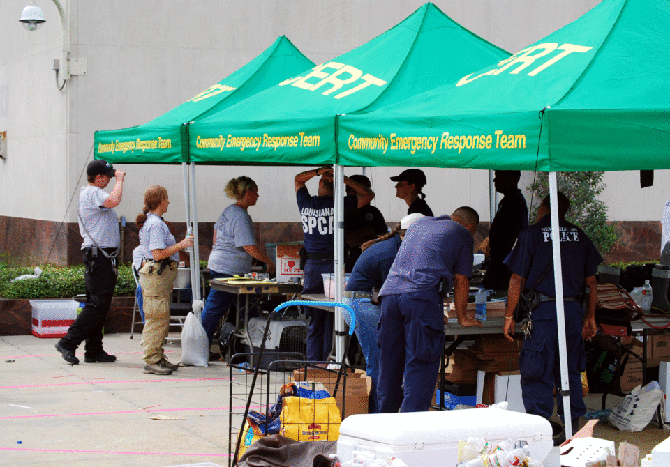 People gathered aroung Community Emergency Response Team tents