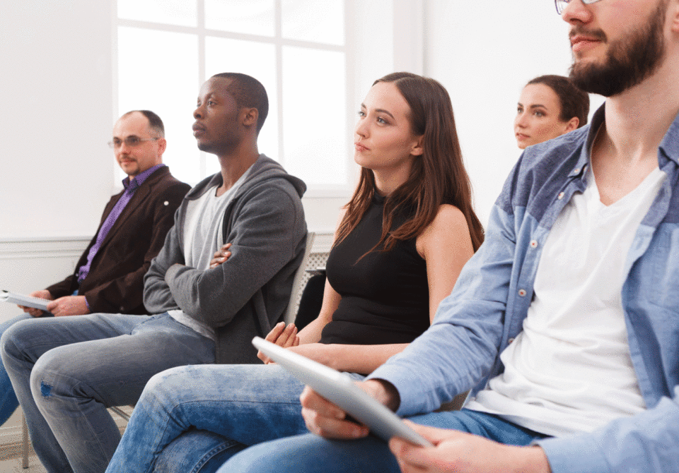 A group of people in a classroom